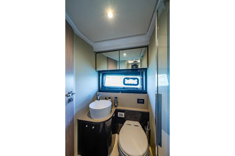 Slide: The Image of Luxurious bathroom interior of 2019 Azimut Atlantis 51 yacht with modern fixtures. - 56