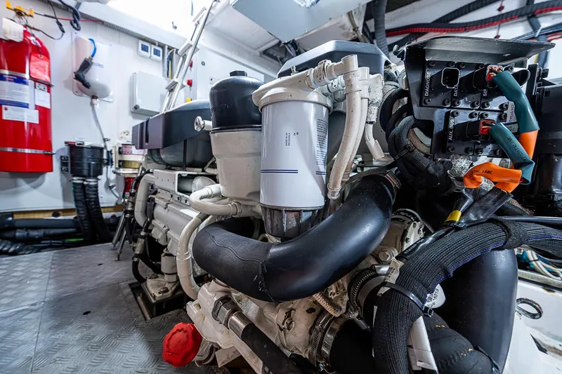 Slide: The Image of Engine room of 2019 Azimut Atlantis 51 yacht, showcasing detailed machinery and components. - 63