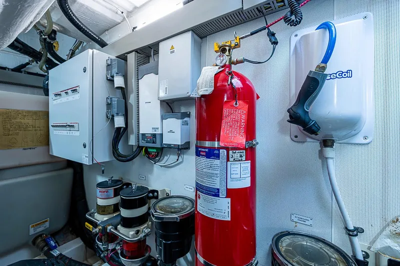 Slide: The Image of Engine room of 2019 Azimut Atlantis 51 yacht with safety equipment and control panels. - 66