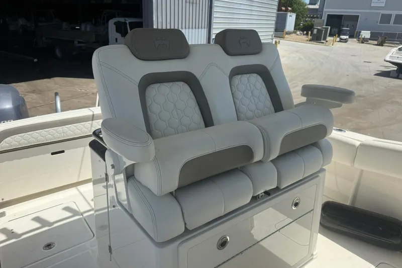 Slide: The Image of Luxury seating on a 2020 World Cat 280 CC-X boat, featuring plush white upholstery. - 14
