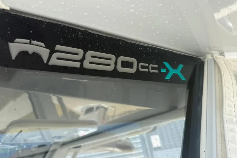 Slide: The Image of World Cat 280 CC-X 2020 model logo on boat window. - 17