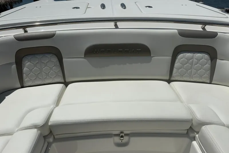 Slide: The Image of 2020 World Cat 280 CC-X boat interior with white cushioned seating. - 19