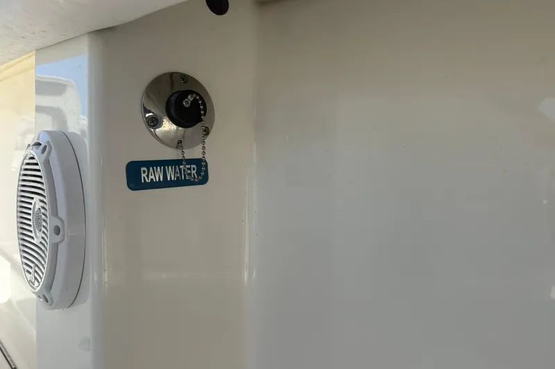 Slide: The Image of 2020 World Cat 280 CC-X boat with raw water access and speaker detail. - 25