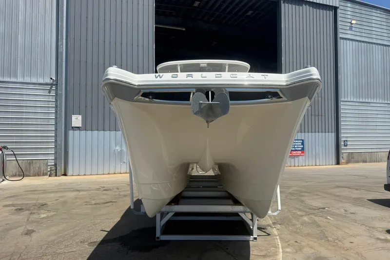 Slide: The Image of 2020 World Cat 280 CC-X boat in front of industrial building. - 28