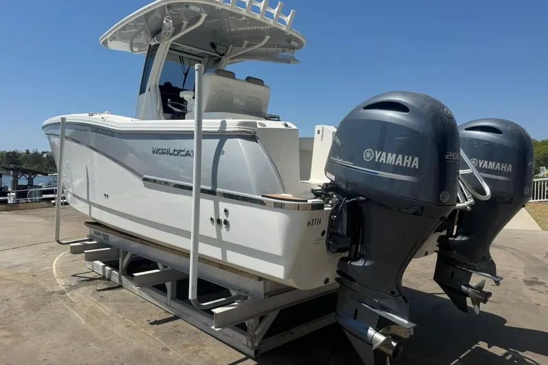 Slide: The Image of 2020 World Cat 280 CC-X boat with dual Yamaha engines on a trailer. - 3