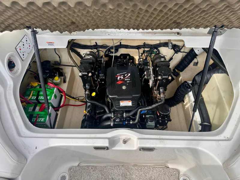 Slide: The Image of Engine compartment of a 2005 Crownline 270 BR boat with MerCruiser engine. - 12