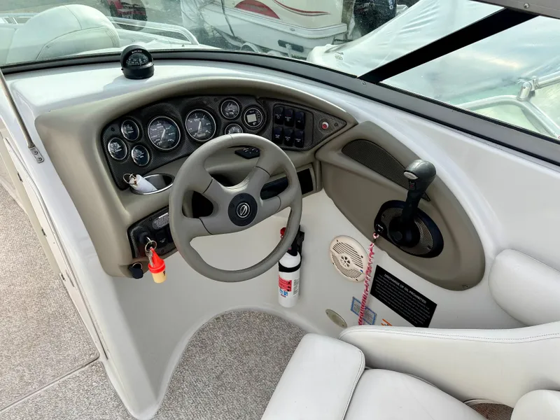 Slide: The Image of Dashboard of a 2005 Crownline 270 BR boat. - 18
