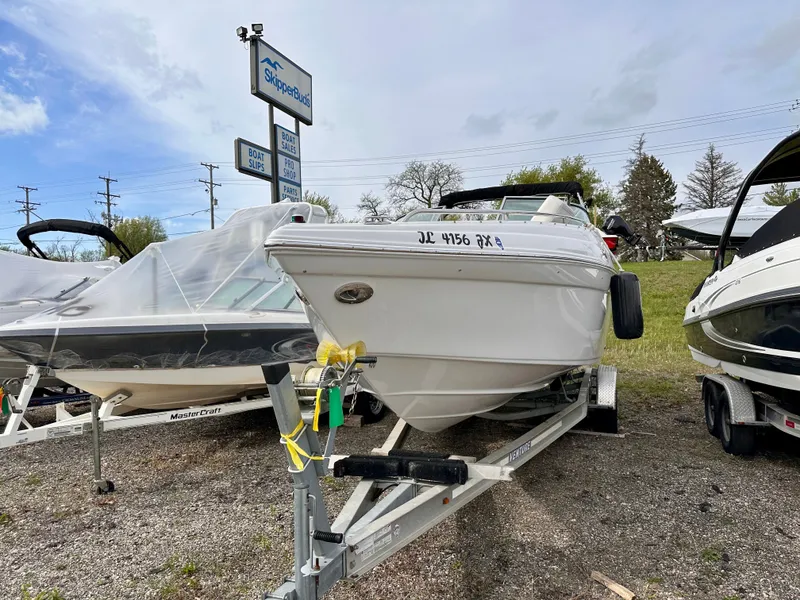 Slide: The Image of 2005 Crownline 270 BR boat on trailer at SkipperBuds. - 2
