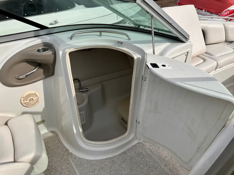 Slide: The Image of Interior of a 2005 Crownline 270 BR with open door. - 22