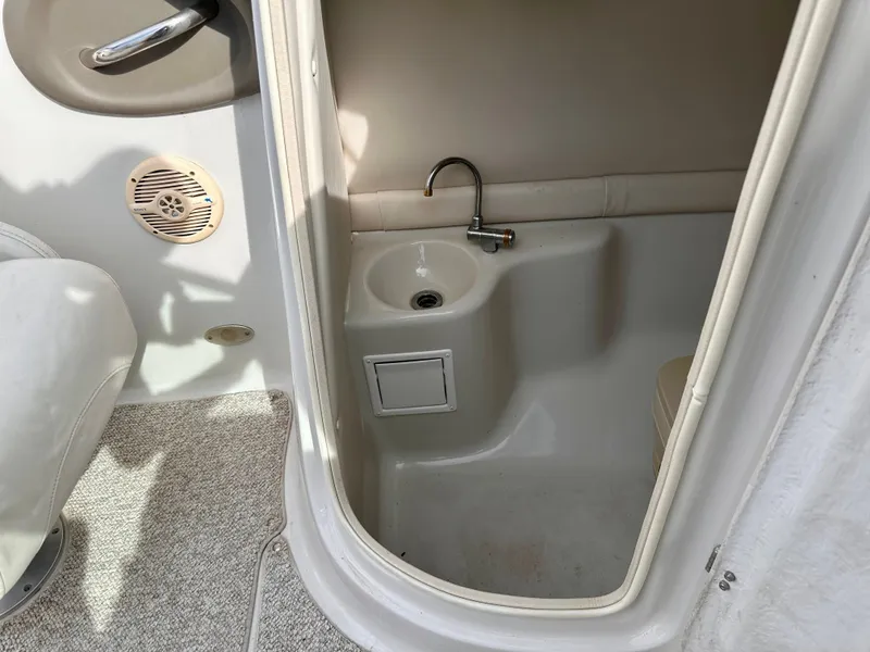 Slide: The Image of Interior of a 2005 Crownline 270 BR with sink. - 24