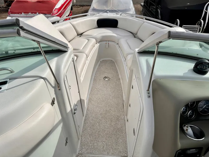 Slide: The Image of Interior of a 2005 Crownline 270 BR boat with seating area. - 28