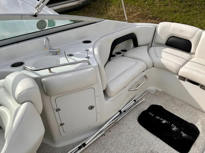 Slide: The Image of Interior of a 2005 Crownline 270 BR boat with seating and sink. - 35