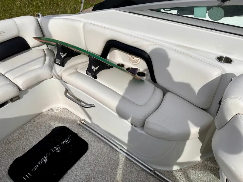 Slide: The Image of Interior of a 2005 Crownline 270 BR boat with surfboard. - 37