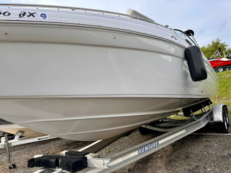 Slide: The Image of 2005 Crownline 270 BR boat on trailer, side view. - 41