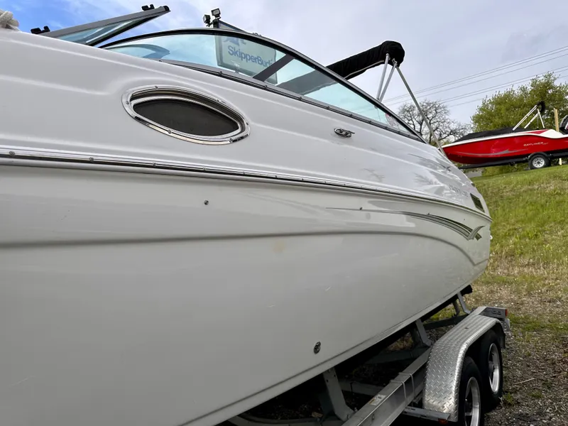 Slide: The Image of 2005 Crownline 270 BR boat on trailer, side view. - 42