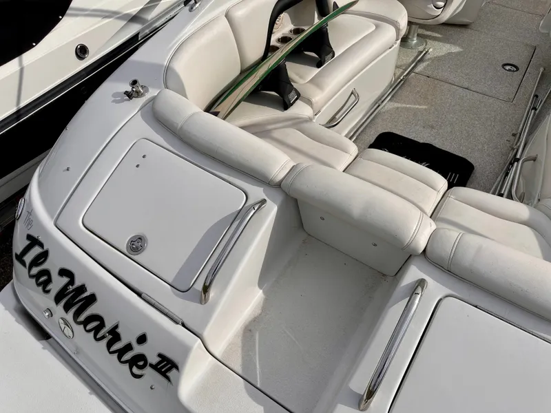 Slide: The Image of Interior of a 2005 Crownline 270 BR boat, white upholstery. - 9