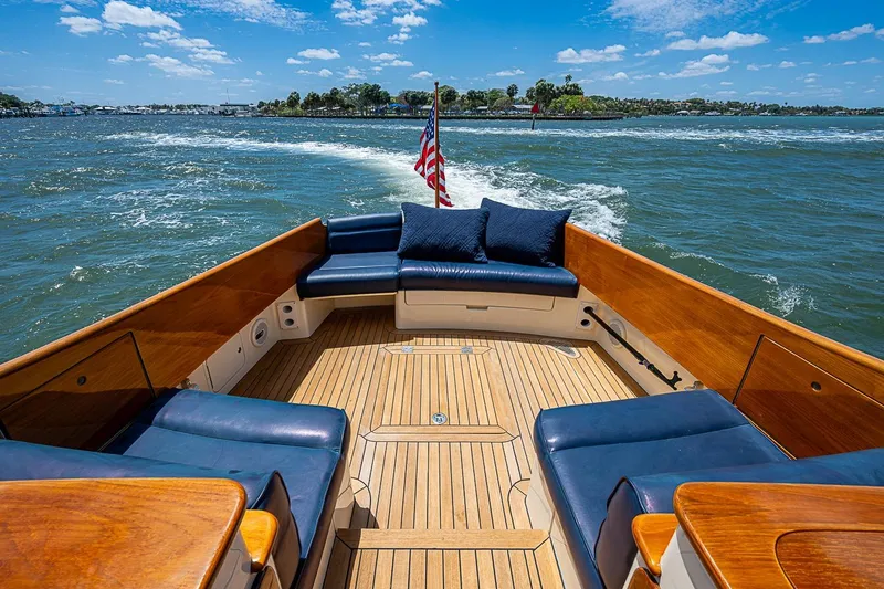 Slide: The Image of Hinckley Picnic Boat 37 MKIII, 2013, cruising on open water with elegant seating. - 4