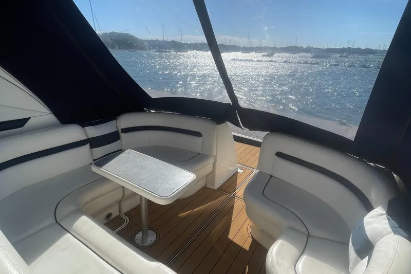 Slide: The Image of Luxurious 2006 Sea Ray 380 Sundancer interior with elegant seating and scenic ocean view. - 19