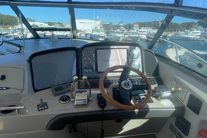 Slide: The Image of Control panel of 2006 Sea Ray 380 Sundancer yacht with Garmin navigation system. - 3