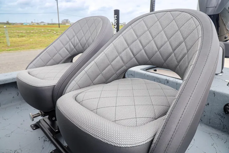Slide: The Image of 2025 Haynie 24 High Output boat seats with diamond-patterned upholstery. - 22