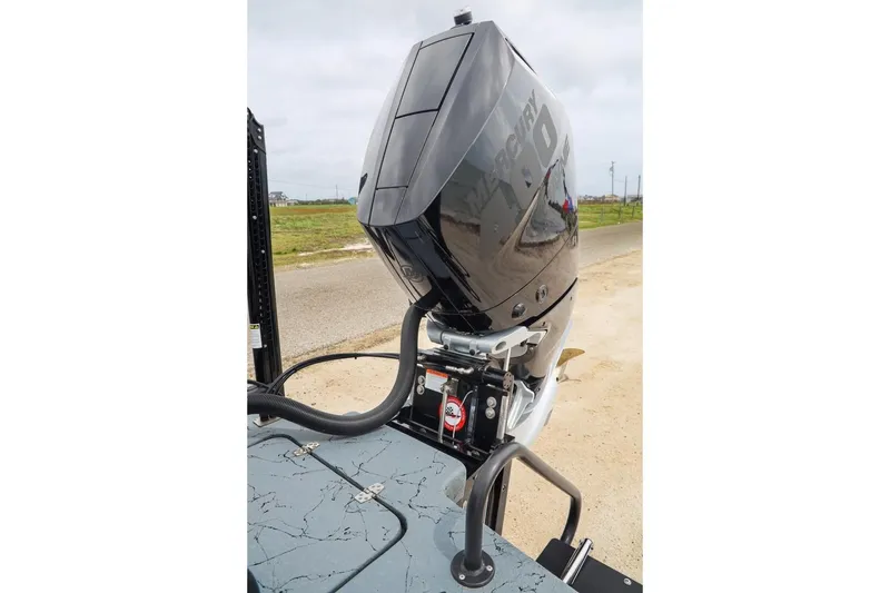 Slide: The Image of 2025 Haynie 24 High Output boat engine, sleek design, outdoor setting. - 48