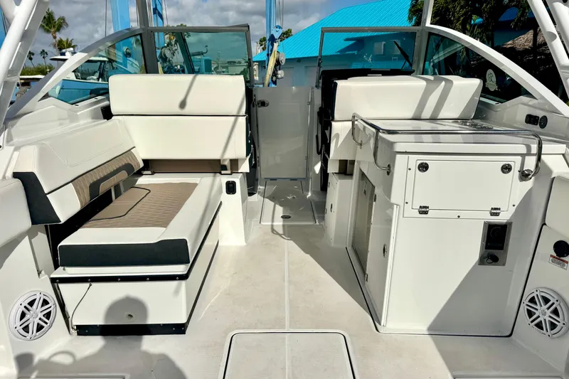 Slide: The Image of 2023 Blackfin 272 DC boat interior with seating and storage compartments. - 20