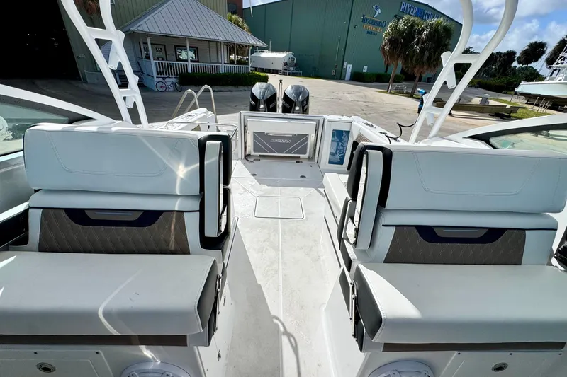 Slide: The Image of 2023 Blackfin 272 DC boat interior with dual seating and modern design. - 24