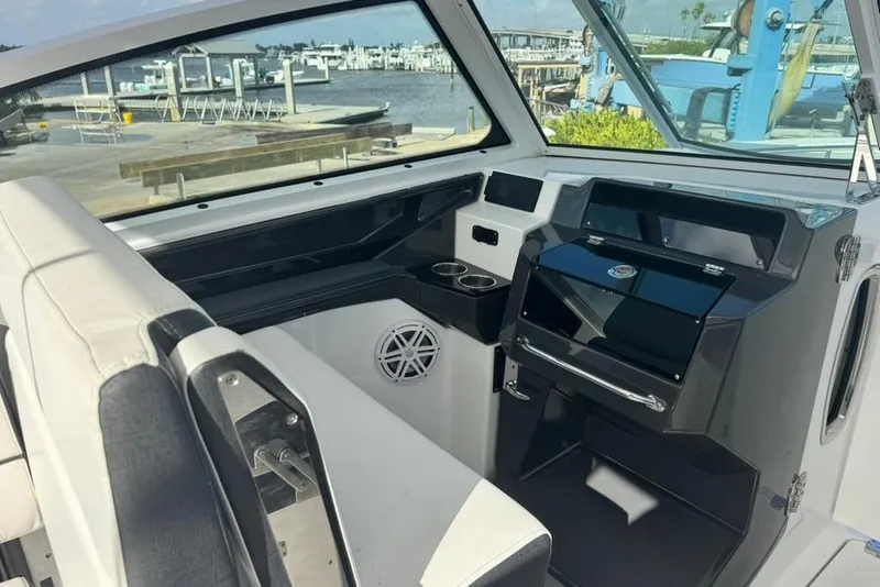 Slide: The Image of Interior view of 2023 Blackfin 272 DC boat, featuring sleek design and modern amenities. - 25