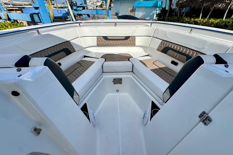 Slide: The Image of 2023 Blackfin 272 DC boat interior with luxurious seating and modern design. - 29