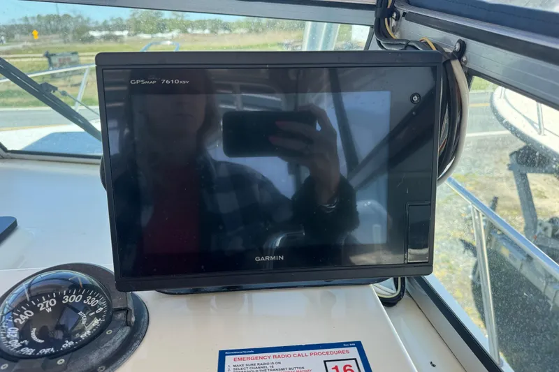 Slide: The Image of Garmin GPSMAP 7610xsv on 2002 Parker 2510 Walkaround boat dashboard. - 5