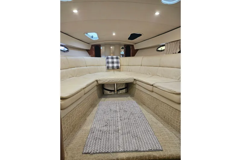 Slide: The Image of Luxurious interior of a 2007 Formula 400 Super Sport yacht with beige seating. - 15