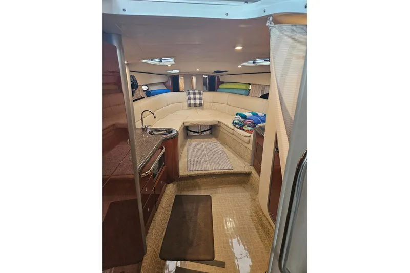 Slide: The Image of Interior of 2007 Formula 400 Super Sport yacht with cozy seating and kitchenette. - 16