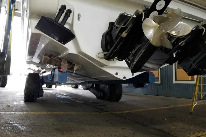 Slide: The Image of 2007 Formula 400 Super Sport boat on trailer, showing propellers and hull details. - 24