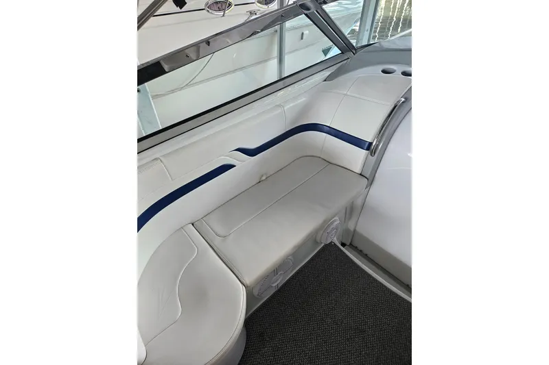 Slide: The Image of 2007 Formula 400 Super Sport boat interior with white and blue seating. - 6