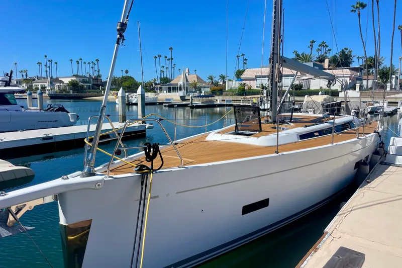 The Image of 2014 Grand Soleil 43F yacht docked in a sunny marina. - 1