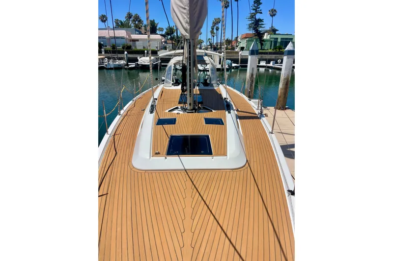 Slide: The Image of 2014 Grand Soleil 43F sailboat with teak deck, docked in a marina. - 13