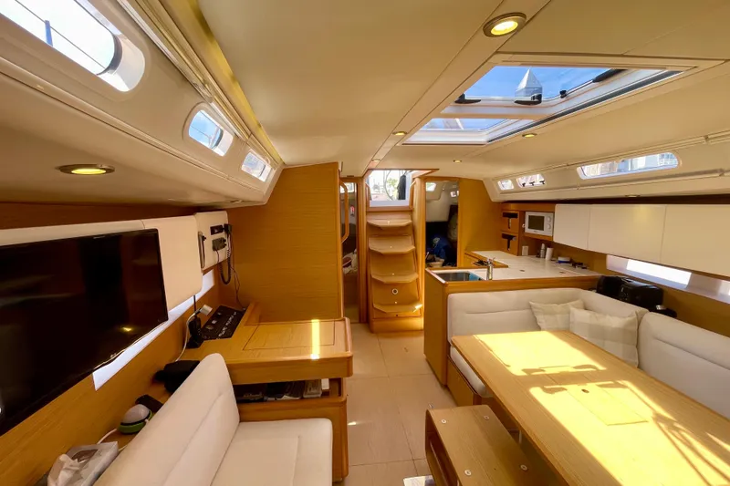 Slide: The Image of Luxurious interior of 2014 Grand Soleil 43F yacht with modern furnishings and ample natural light. - 23