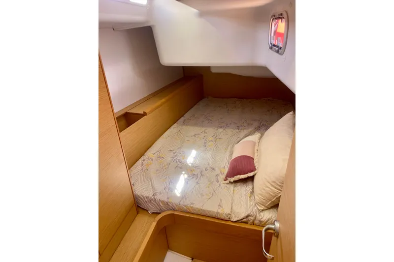 Slide: The Image of Cozy cabin interior of 2014 Grand Soleil 43F yacht with comfortable bedding. - 24