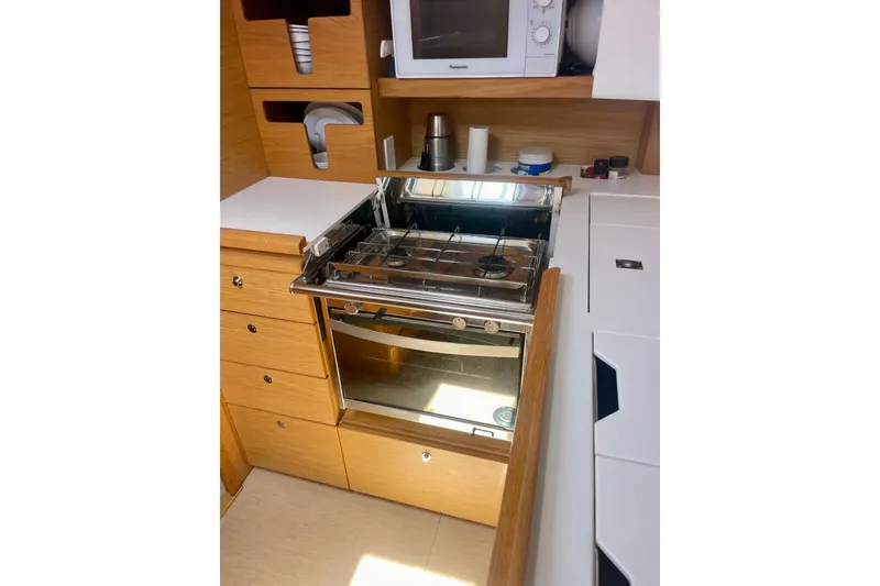 Slide: The Image of Modern kitchen in 2014 Grand Soleil 43F yacht with stove and microwave. - 29