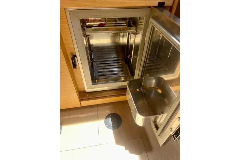 Slide: The Image of Stainless steel refrigerator inside 2014 Grand Soleil 43F yacht kitchen. - 30