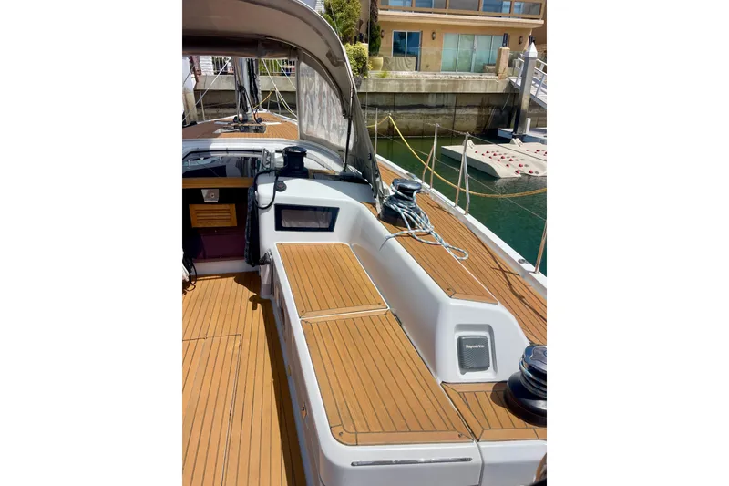 Slide: The Image of Grand Soleil 43F 2014 yacht deck with teak finish in marina setting. - 31
