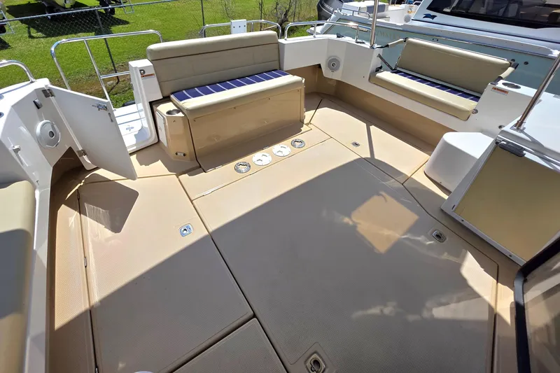 Slide: The Image of Spacious deck of 2020 Ranger Tugs R-31 CB with comfortable seating and open layout. - 10