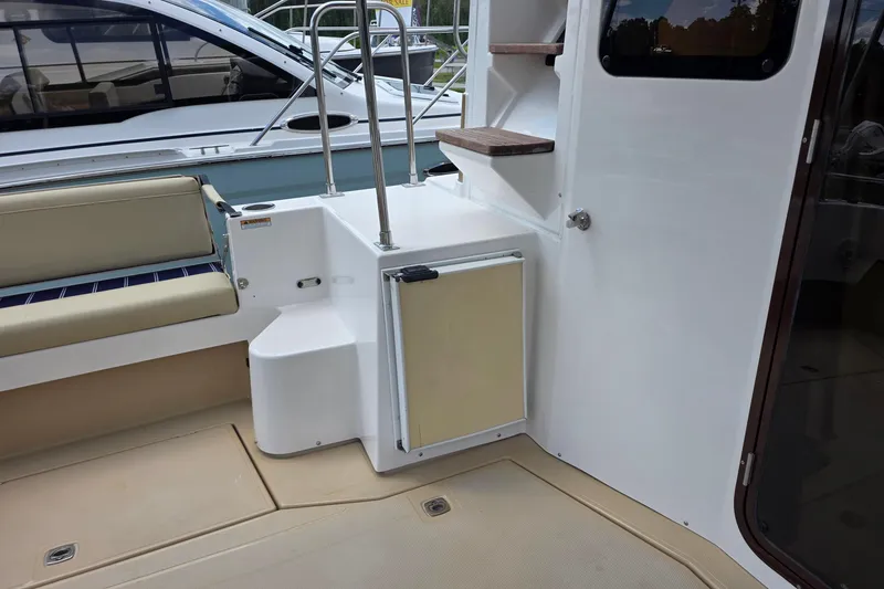 Slide: The Image of 2020 Ranger Tugs R-31 CB boat interior with seating and steps. - 12