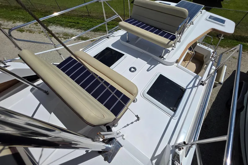 Slide: The Image of 2020 Ranger Tugs R-31 CB boat deck with seating and solar panels. - 15