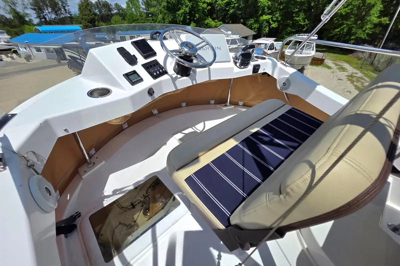 Slide: The Image of 2020 Ranger Tugs R-31 CB helm with modern controls and comfortable seating. - 17