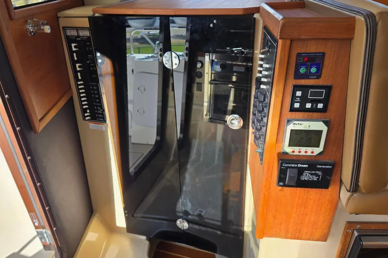 Slide: The Image of Control panel of a 2020 Ranger Tugs R-31 CB boat interior. - 25