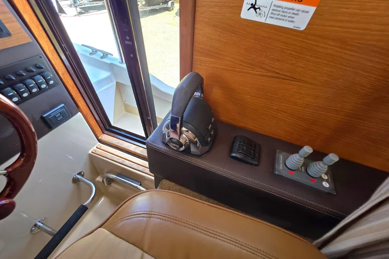Slide: The Image of 2020 Ranger Tugs R-31 CB helm controls with throttle and joystick. - 35