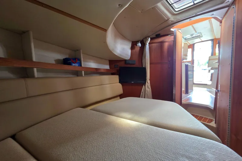 Slide: The Image of Interior cabin of 2020 Ranger Tugs R-31 CB with cozy seating and natural light. - 37