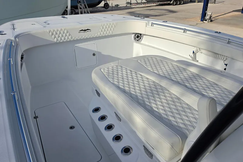 Slide: The Image of Luxurious seating on 2026 Invincible 33 Catamaran, featuring diamond-stitched upholstery and sleek design. - 22