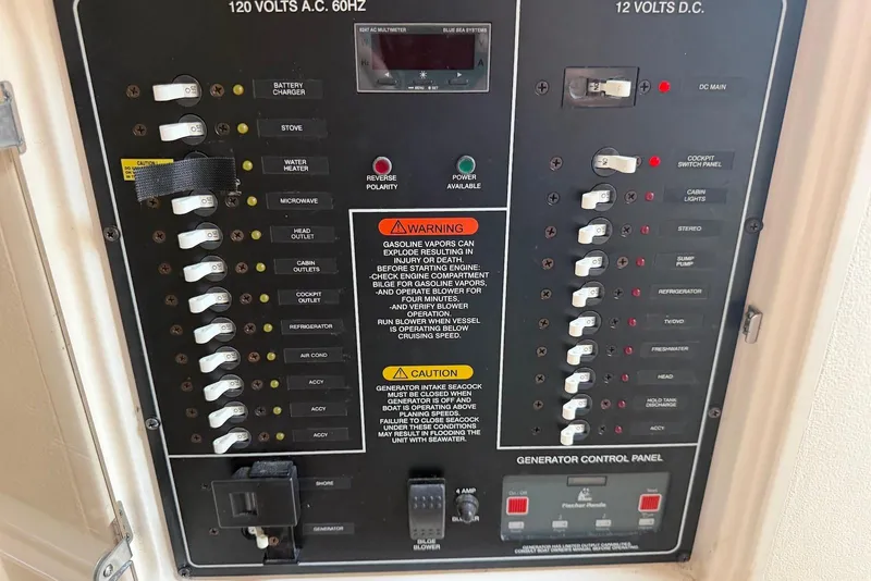 Slide: The Image of Electrical control panel on a 2007 Grady-White Express 330 boat. - 18